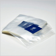 Labeling image[Applying labels to sheet bag packagings]